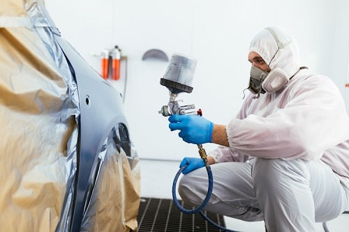 Recobrimento e envernizamento de uma pintura