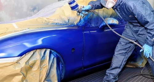 Recobrimento e envernizamento de uma pintura
